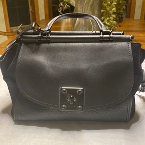 Unique Coach black suede and leather handbag